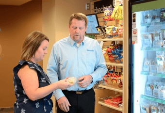 Bernick's Employee Treating Guest at Micro Market