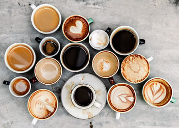 varying types of coffee in cups